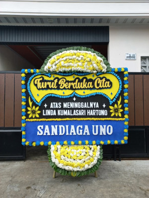 Papan Bunga Duka di Kairagi Weru