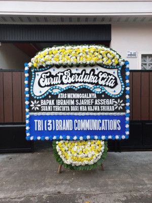 Papan Bunga Duka di Kairagi Weru